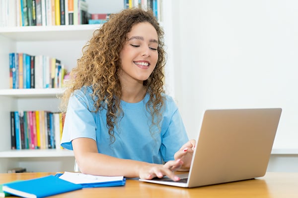 LAU Student working on laptop