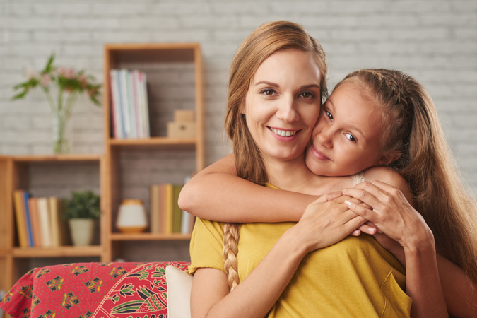 Mother and Daughter Hugging